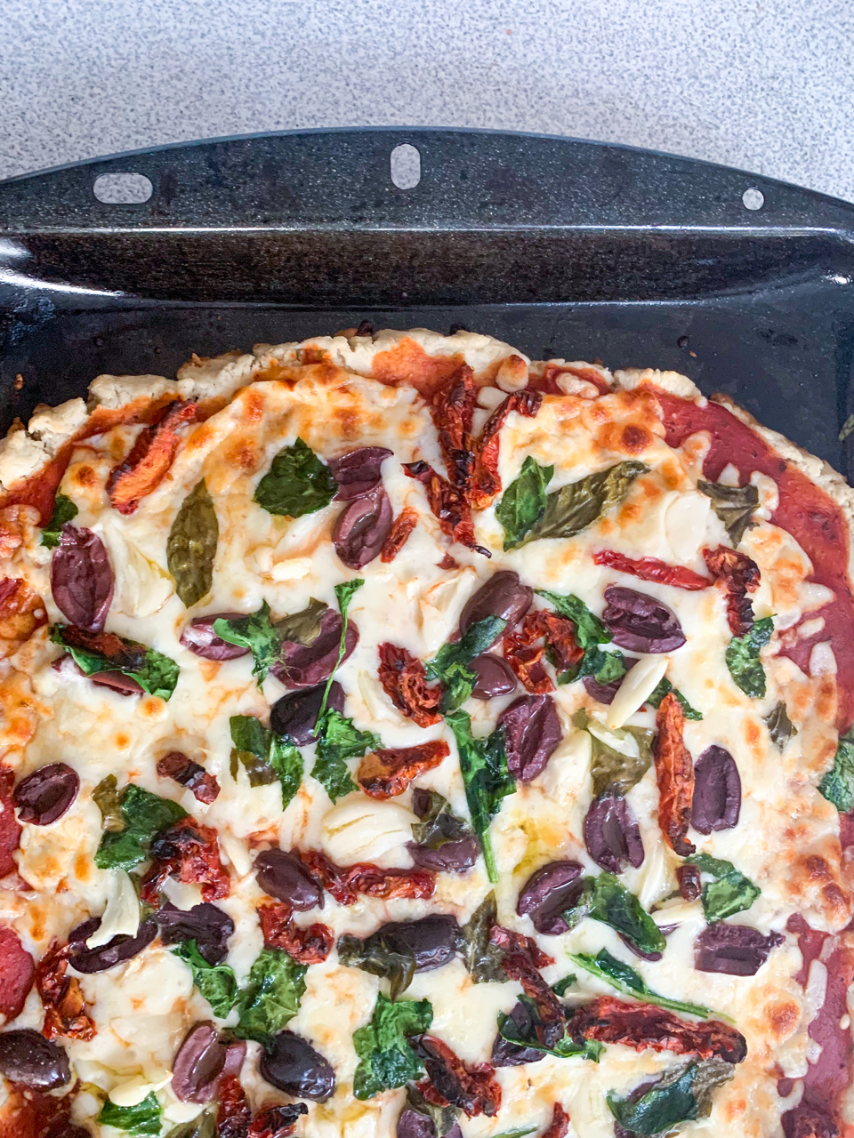 Garlic, Sundried Tomato, and Kalamata Olive Pizza